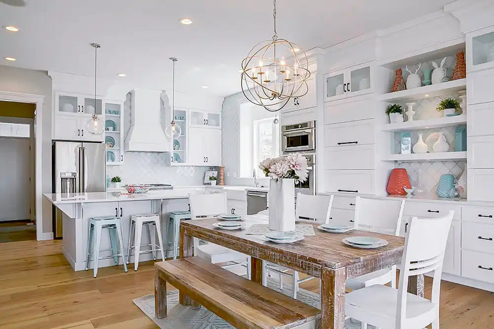 Bright kitchen with wooden table.
