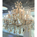 Maria Theresa Polished Chrome Golden Teak Crystal 28 Light Chandelier - Chandeliers